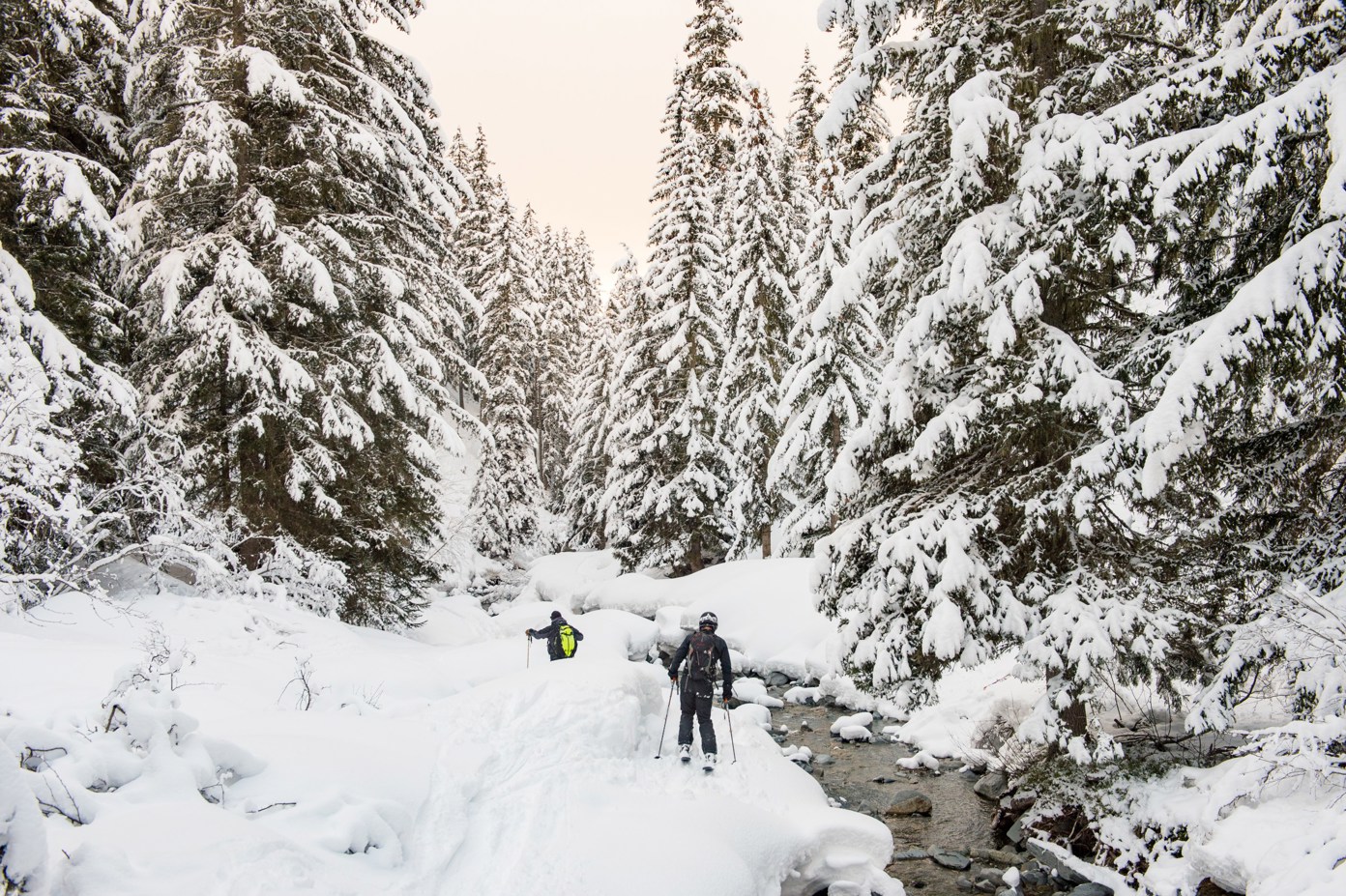 Two skiers tour through the French Alps.